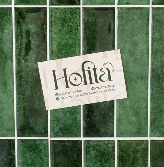 HOLITA Head Spa Frankfurt logo and interior detail